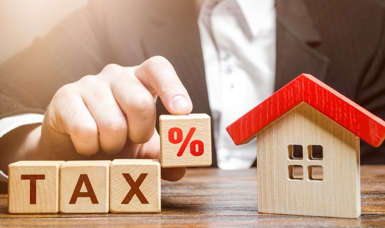 Cover image for post with title Real Estate Taxes vs. Property Taxes | Redy